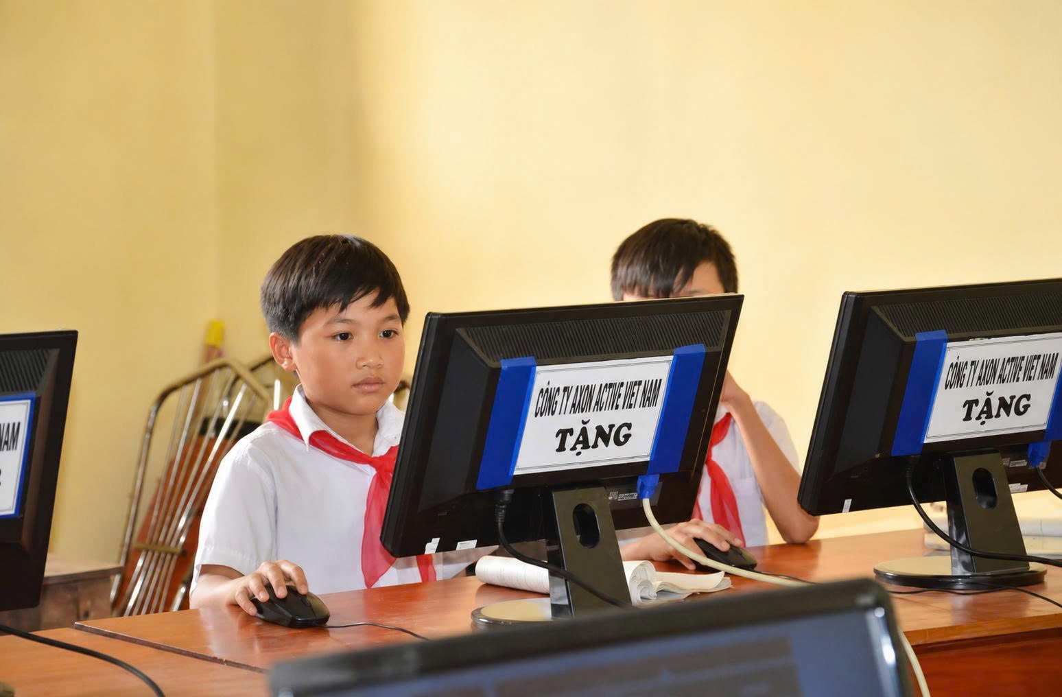 Student using Computer Donated by Axon Active